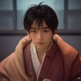 陈墨白，捆绑调教导航站技术与产品负责人，短发青年男性，坐在电脑前，背景为代码屏幕